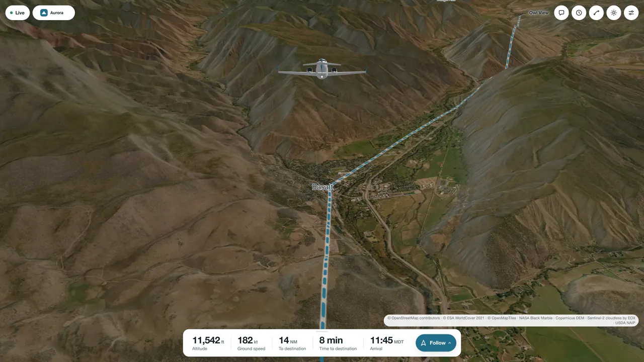 The follow view by day: the jet over the town of Basalt in the Roaring Fork valley at 11,465 feet, eight minutes from Aspen, its track running down the valley