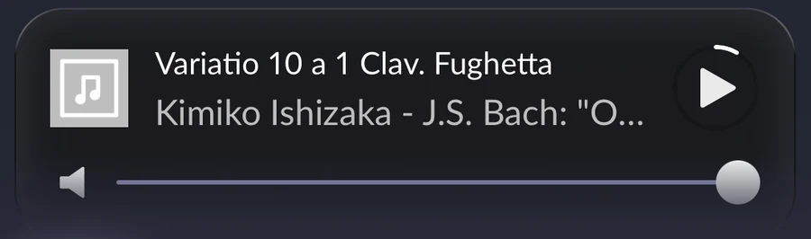 Now-playing bar with track title, artist, play button and volume slider